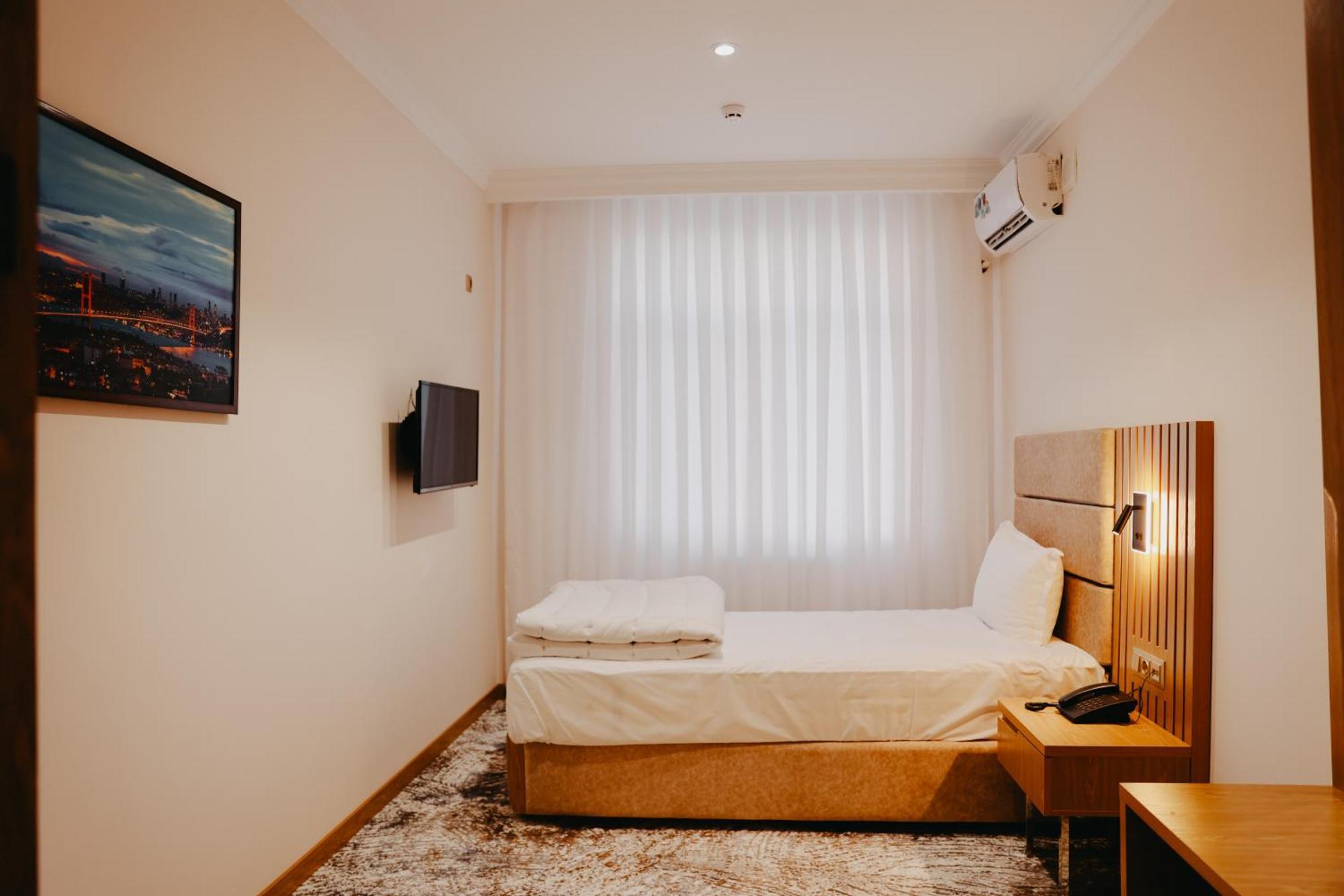 Damir Hotel Nukus Bagian luar foto